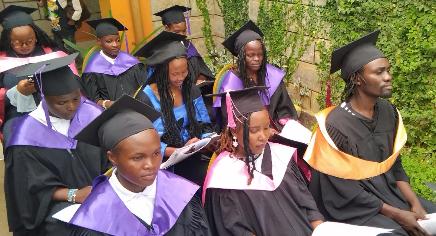 Graduates seated ahead of the ceremony